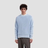 WASHED KNITTED ESSENTIAL CREW NECK van OLAF HUSSEIN in de uitvoering Windsurfer — afbeelding 1 van 4