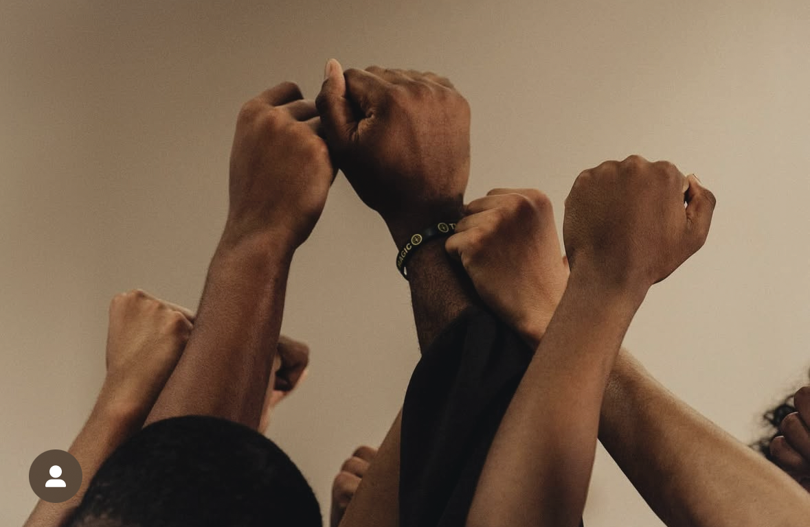 Raised fists in unity